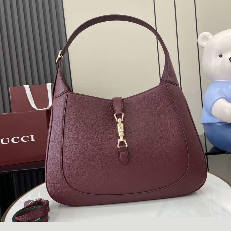 G*u*i top handle bags